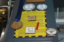 Medalhas feitas em máquina do laboratório maker.